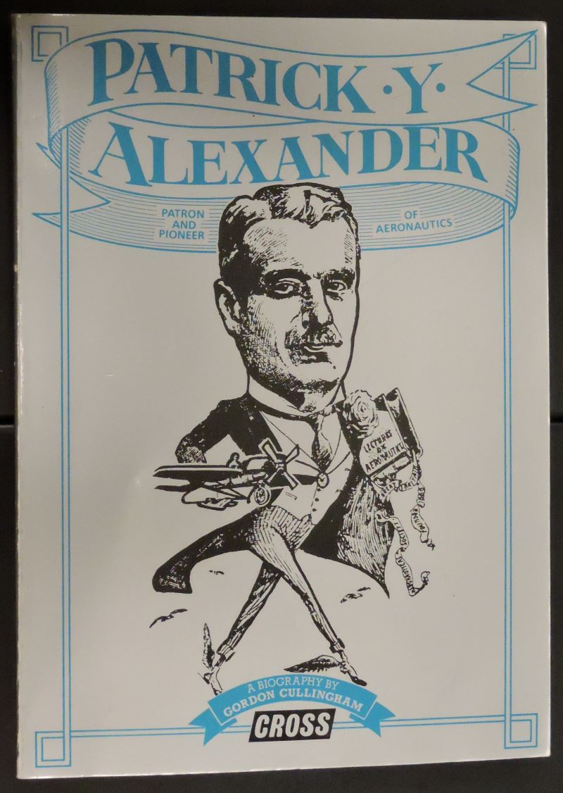 Picture of pictorial cover of book showing cartoon drawing of the biography's subject, well-dressed,  carrying model aeroplane under one arm and a book of lecture notes under the other